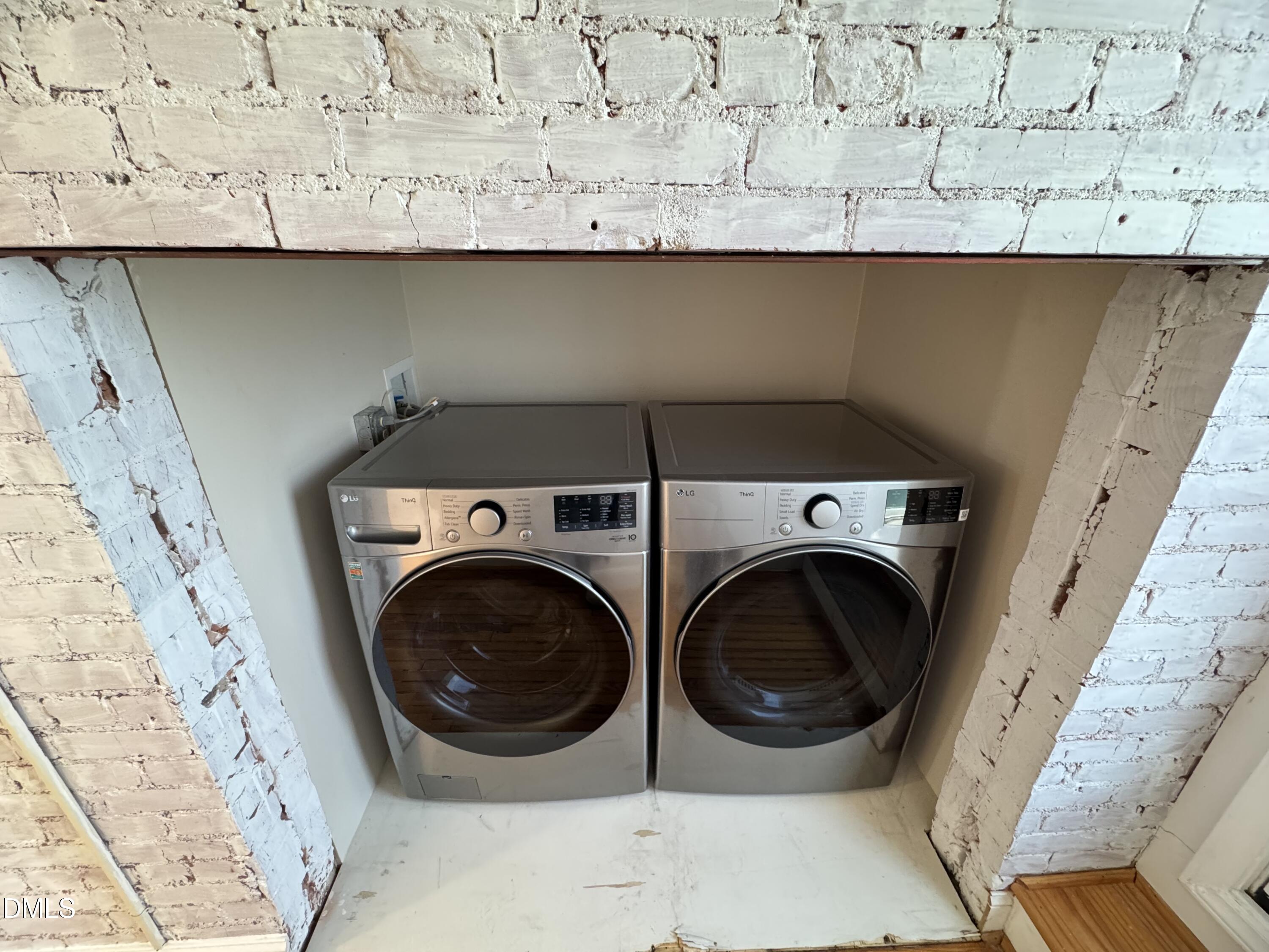 109 West Main Street, Unit 402 Durham, NC 27701 - Photo 15 of 19 a utility room with dryer and washer