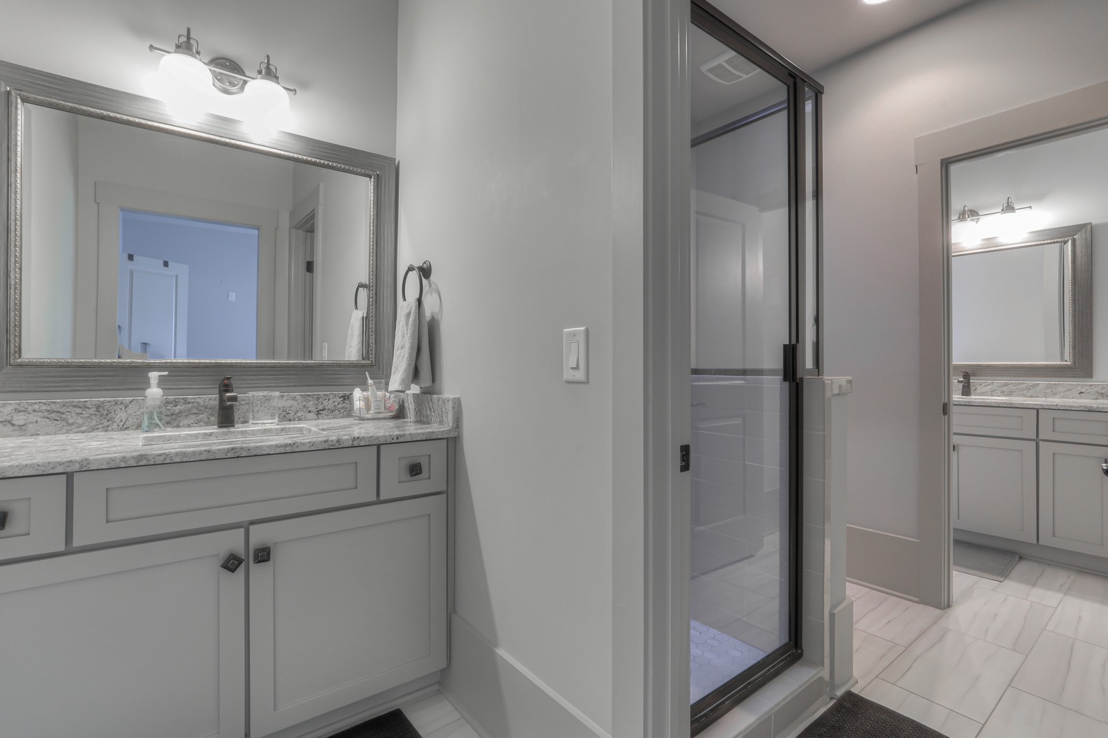 4554 Peytonsville Road Franklin, TN 37064 - Photo 17 of 29 a bathroom with a granite countertop sink and a mirror