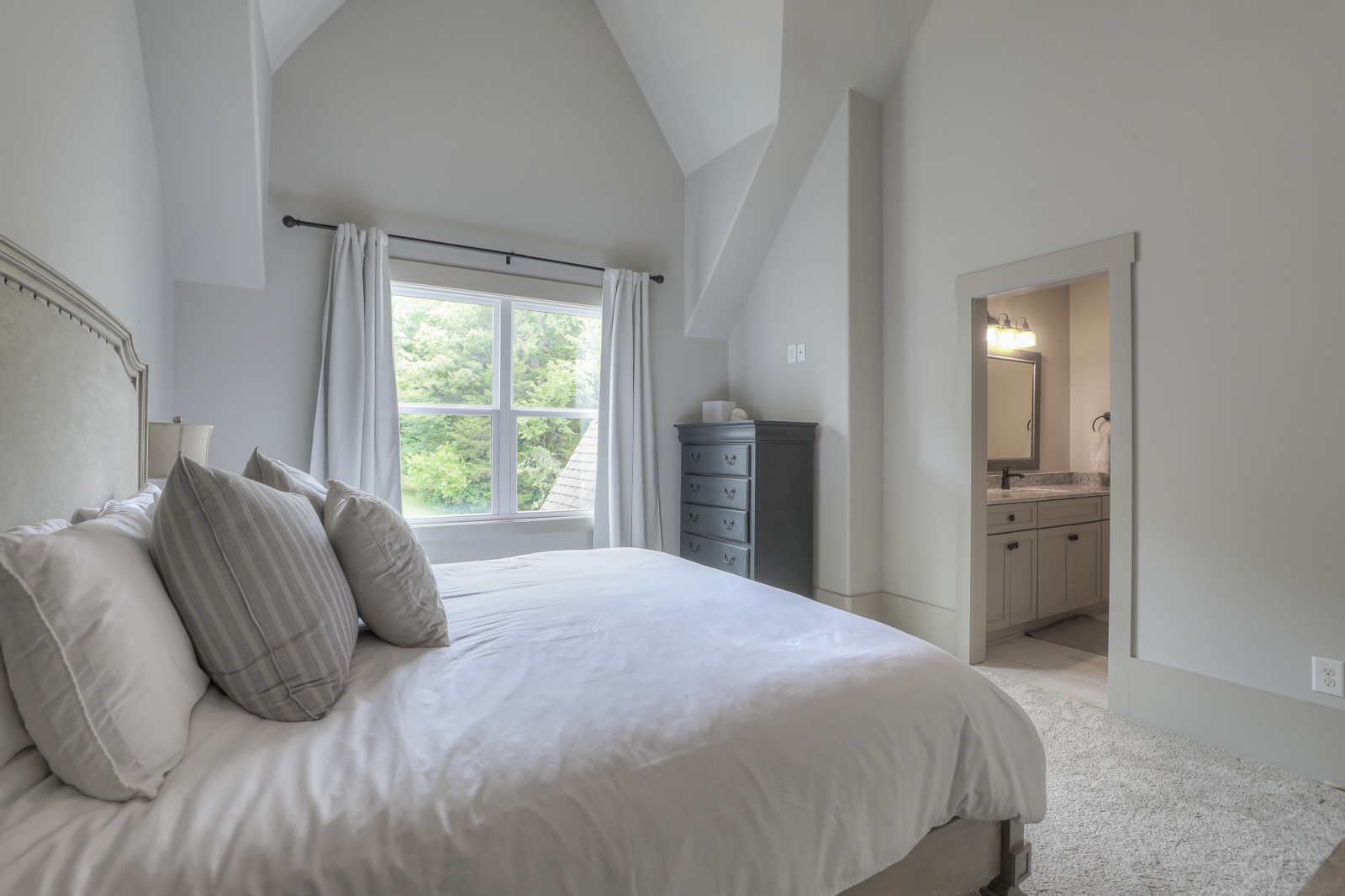4554 Peytonsville Road Franklin, TN 37064 - Photo 18 of 29 a bedroom with a large bed and a large window