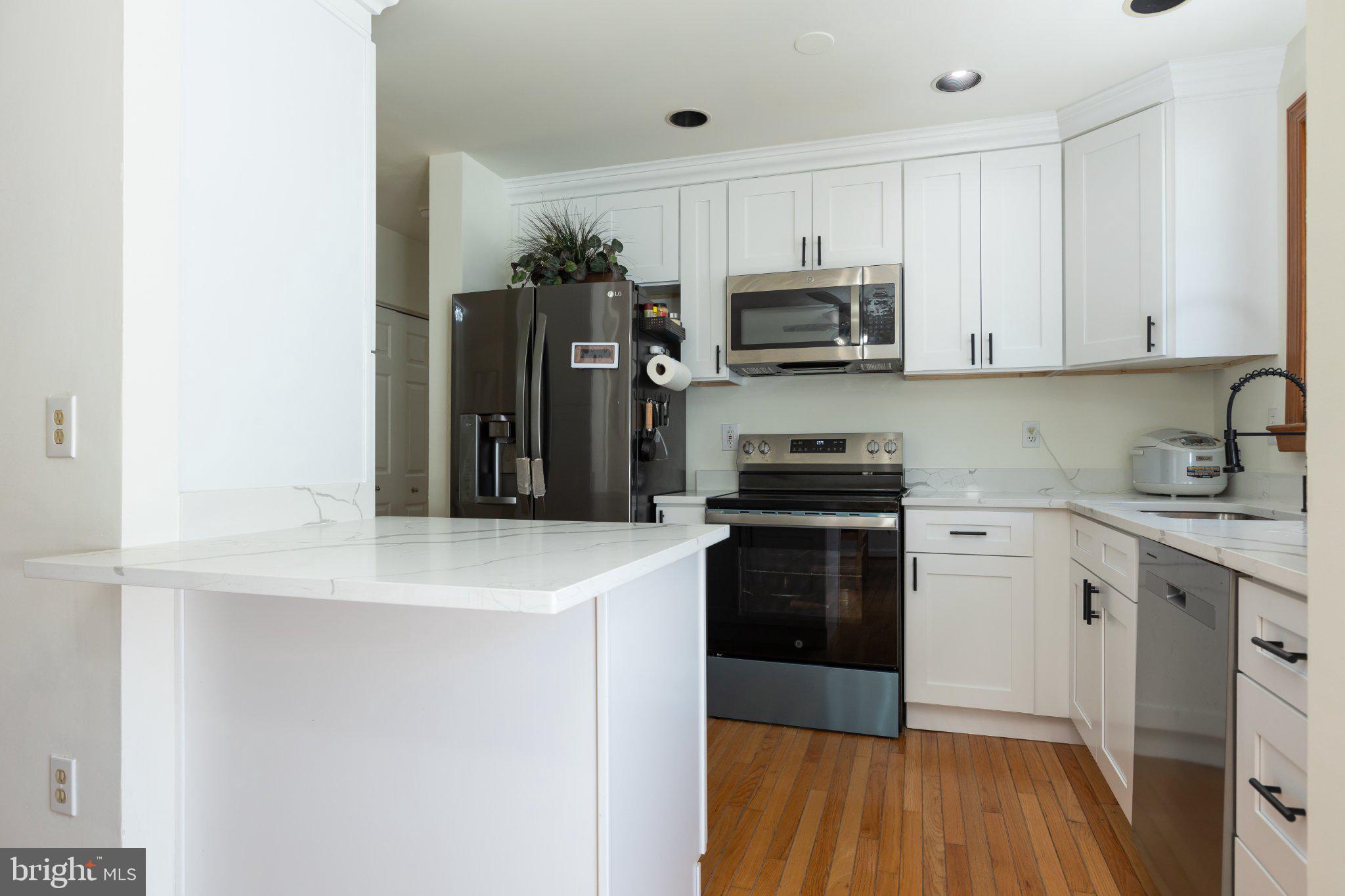 3613 Rusty Rim Ellicott City, MD 21043 - Photo 10 of 39 Modern kitchen with sleek finishes.