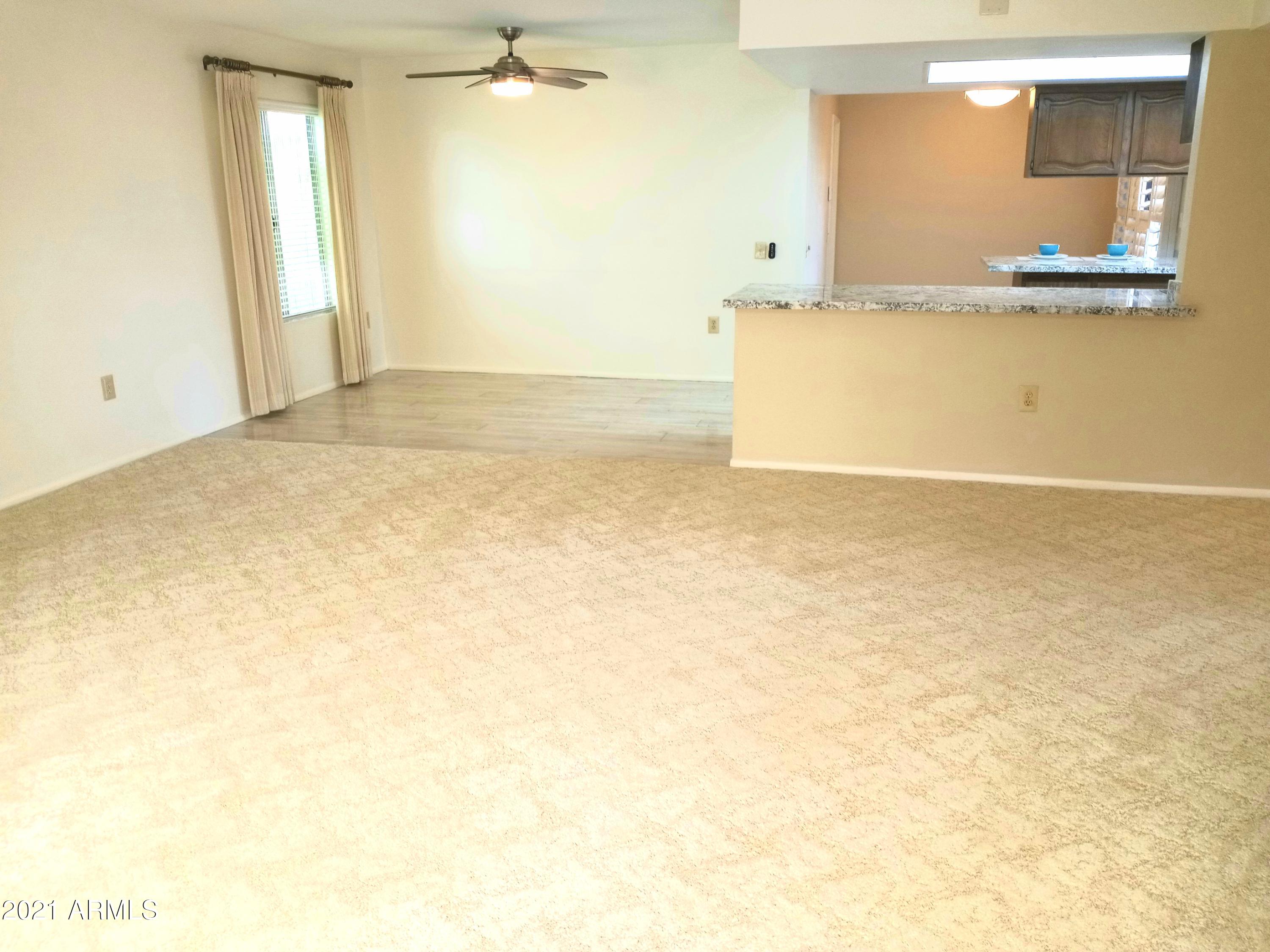 9705 West Oak Ridge Drive Sun City, AZ 85351 - Photo 14 of 35 Living & Dining Room