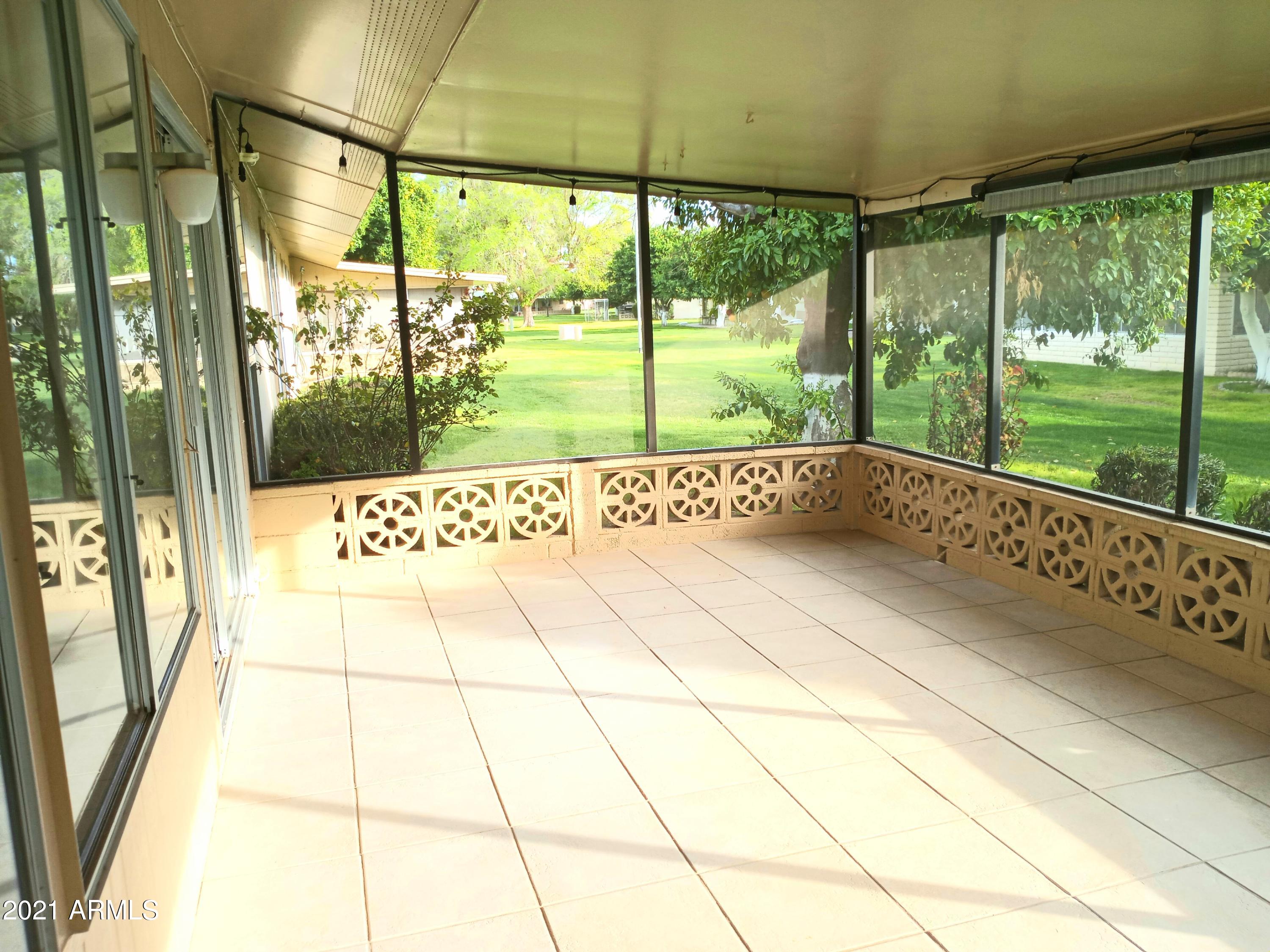 9705 West Oak Ridge Drive Sun City, AZ 85351 - Photo 17 of 35 Patio to the Left