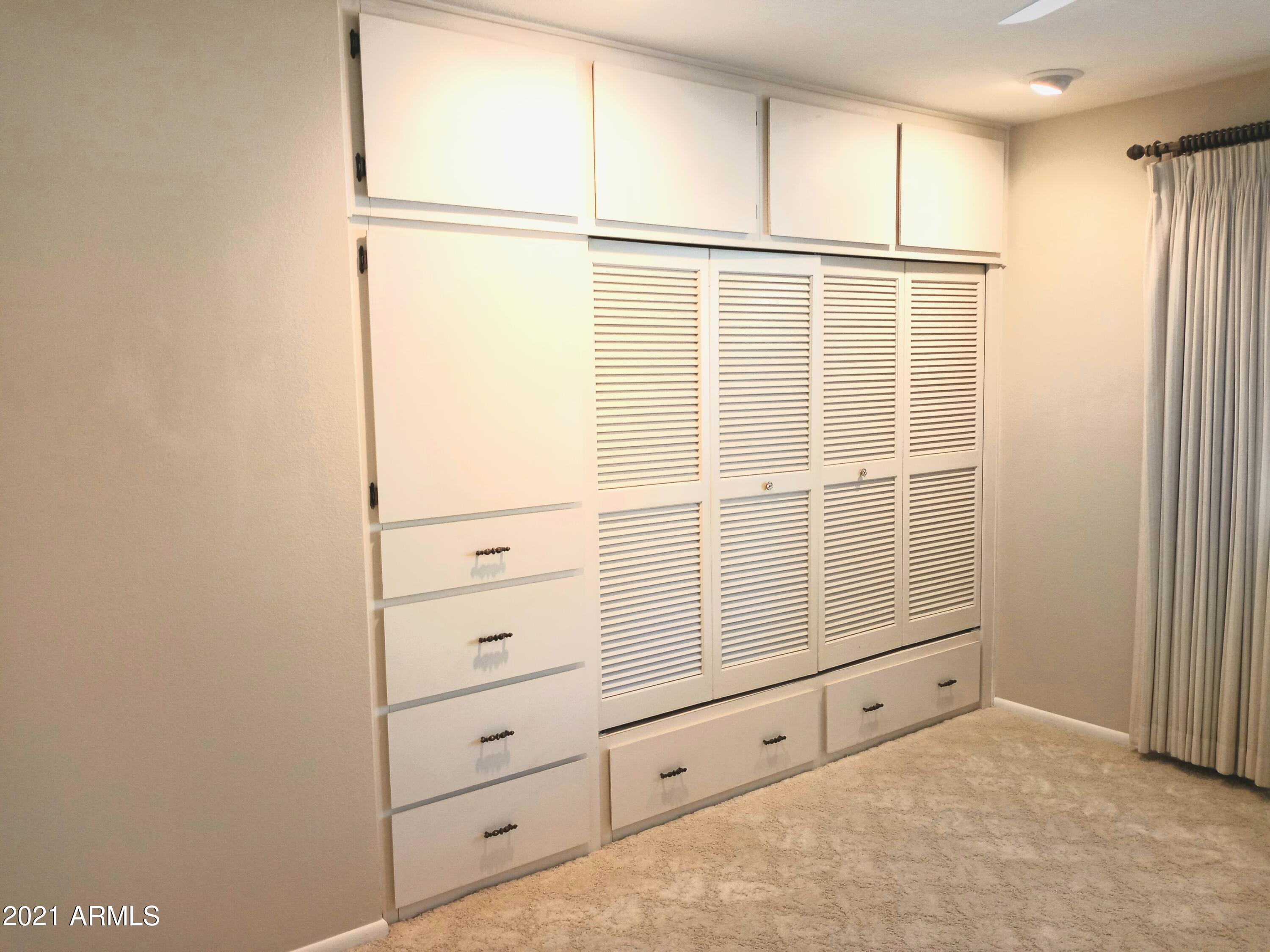 9705 West Oak Ridge Drive Sun City, AZ 85351 - Photo 23 of 35 2nd Bedroom Built in Closets & Drawers