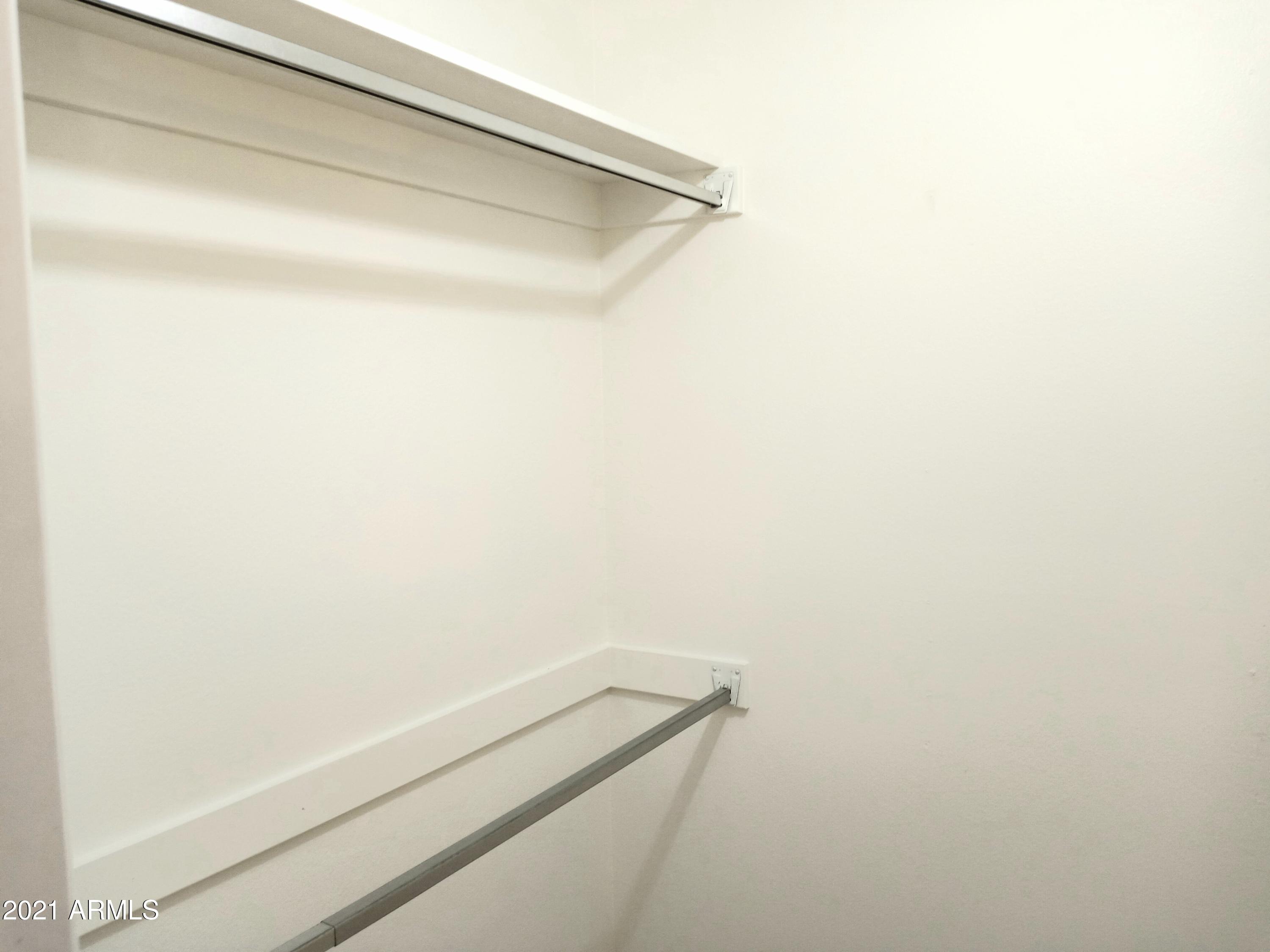 9705 West Oak Ridge Drive Sun City, AZ 85351 - Photo 27 of 35 Walk In Bedroom Closet