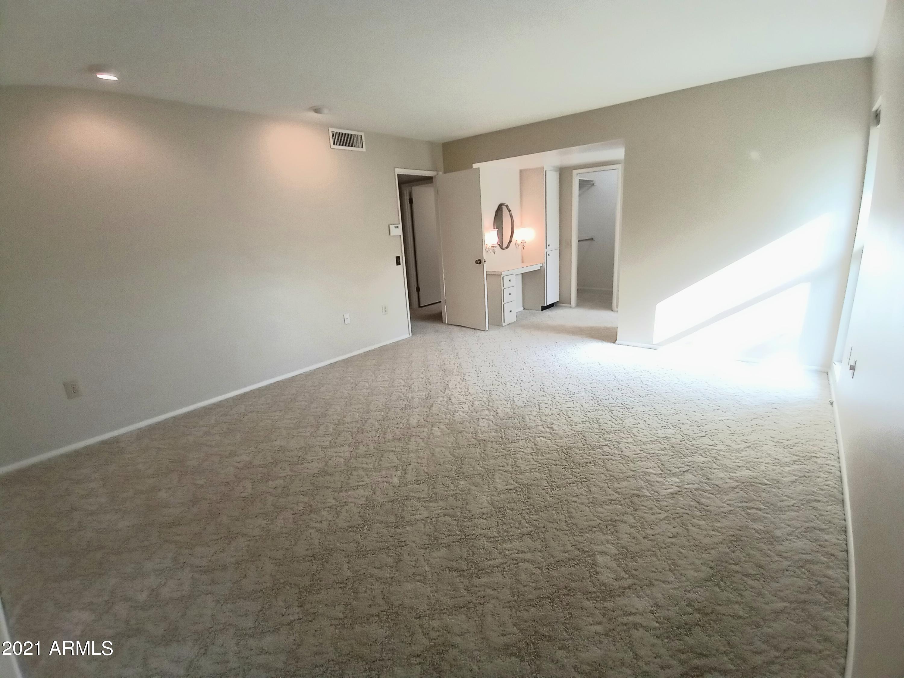 9705 West Oak Ridge Drive Sun City, AZ 85351 - Photo 28 of 35 Master Bedroom Towards Door