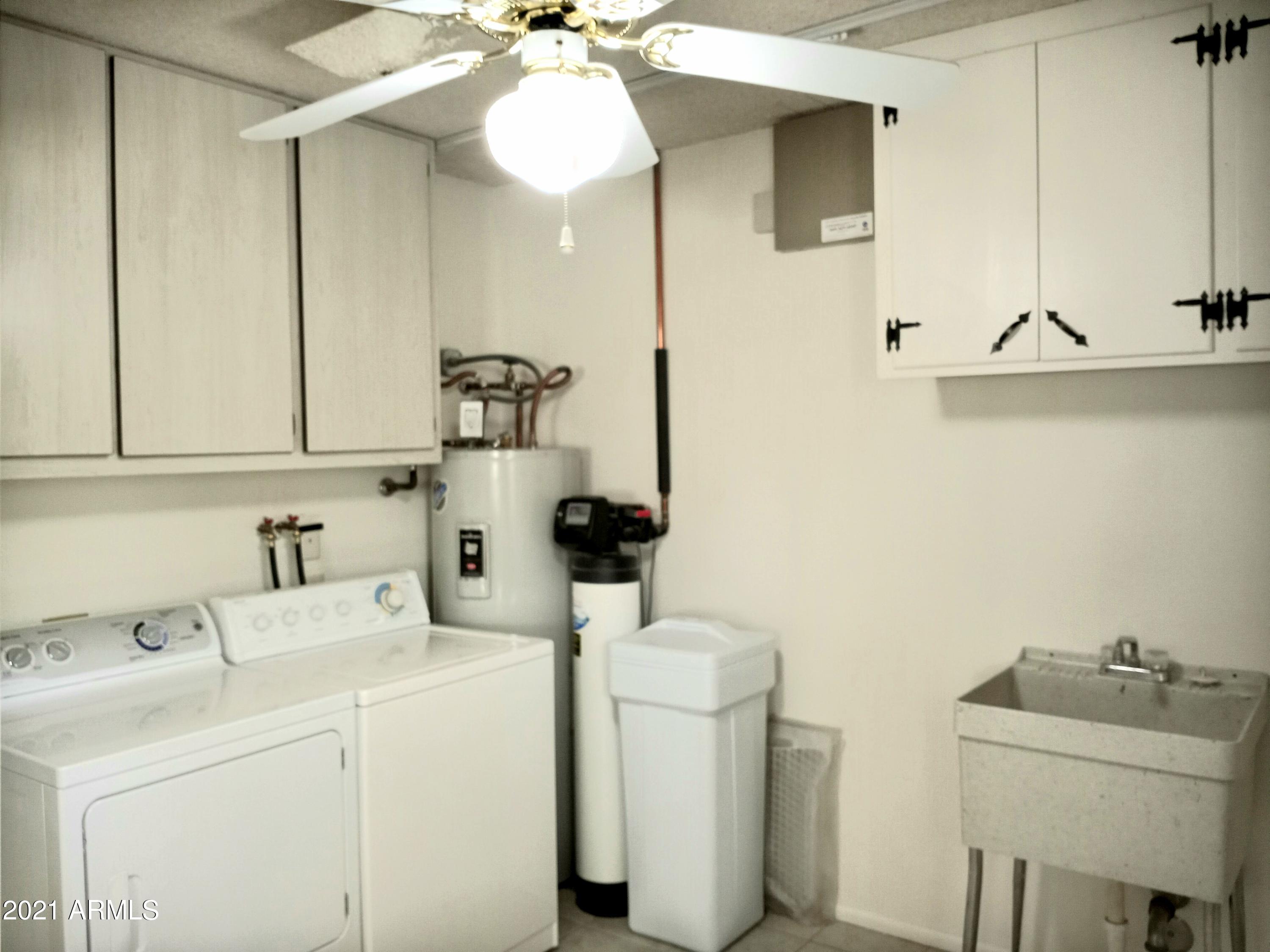 9705 West Oak Ridge Drive Sun City, AZ 85351 - Photo 33 of 35 Laundry Room