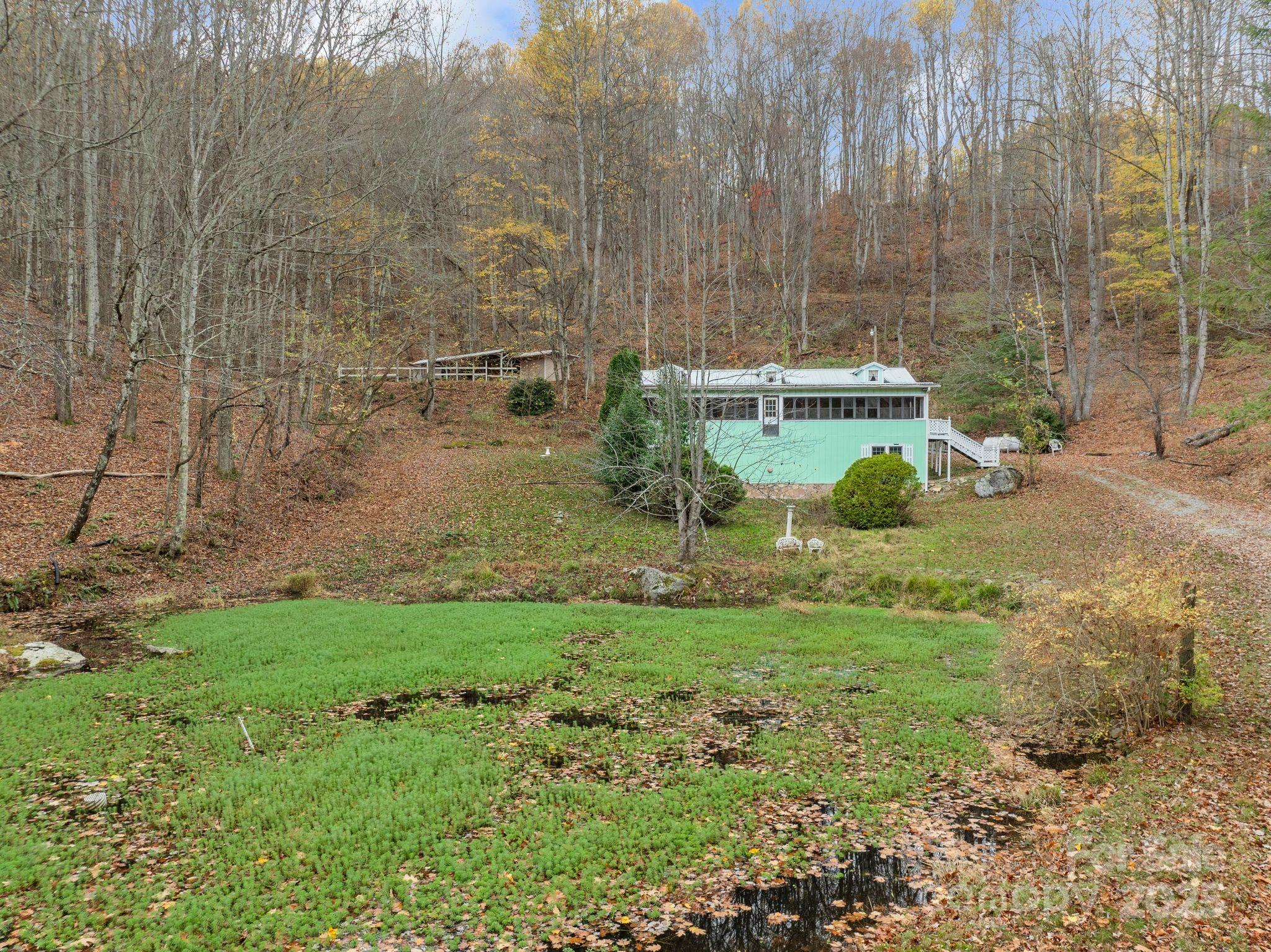 61 Doe Loop Hot Springs, NC 28743 - Photo 4 of 37 a view of a backyard with fountain