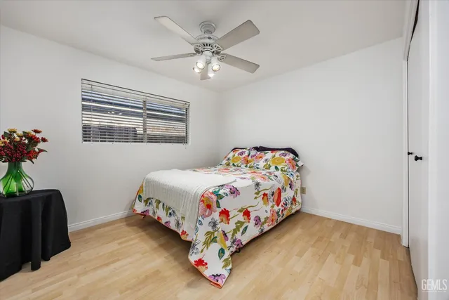 a bedroom with a bed and closet