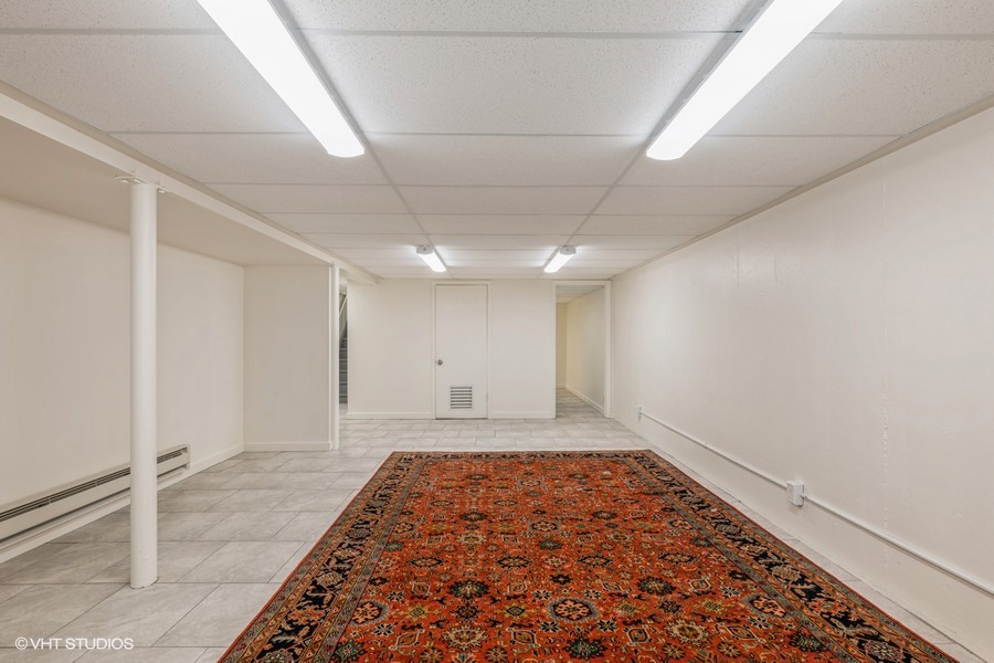 107 Ridge Road Highland Park, IL 60035 - Photo 14 of 20 an empty room with wooden floor