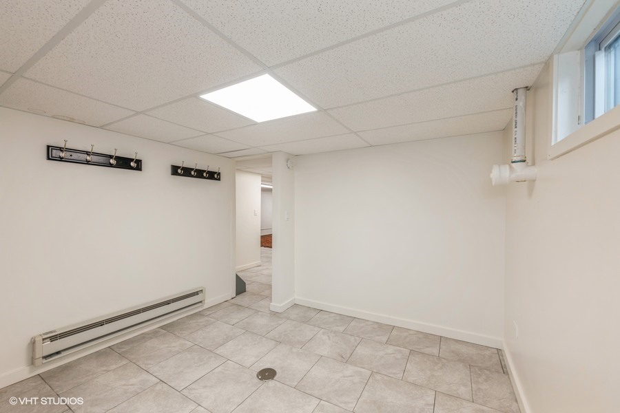 107 Ridge Road Highland Park, IL 60035 - Photo 17 of 20 a view of a room with racks on the wall