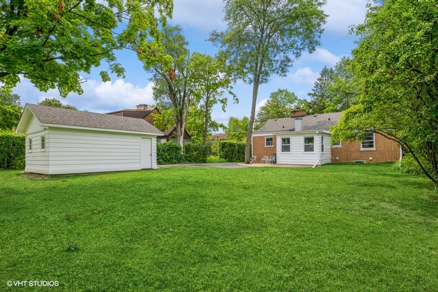 107 Ridge Road Highland Park, IL 60035 - Photo 19 of 20 a view of a house with a yard