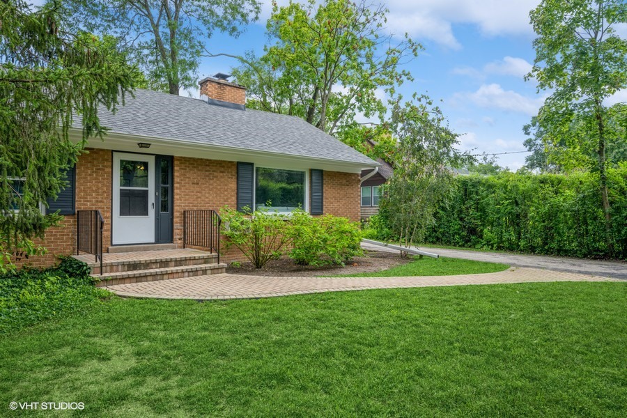 107 Ridge Road Highland Park, IL 60035 - Photo 2 of 20 a view of a house with a yard and plants