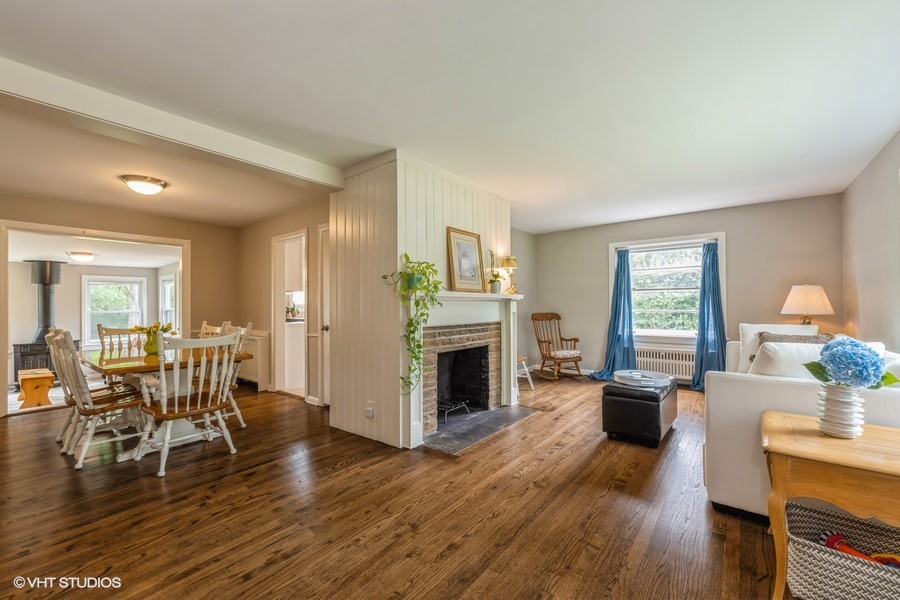 107 Ridge Road Highland Park, IL 60035 - Photo 3 of 20 a living room with furniture wooden floor and a fireplace