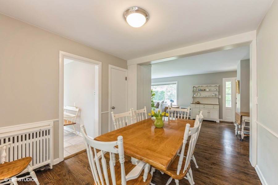 107 Ridge Road Highland Park, IL 60035 - Photo 8 of 20 a dining room with furniture and wooden floor