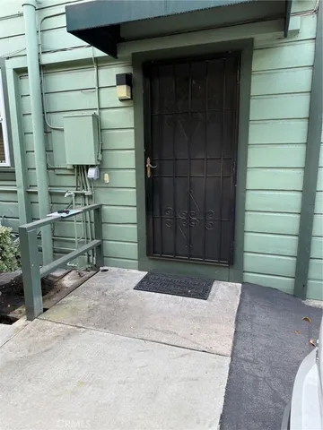 a view of entrance gate of the house