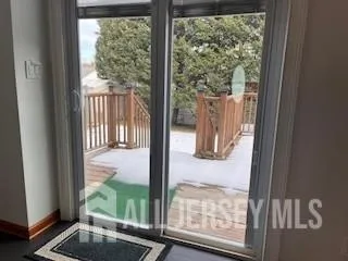 a view of a livingroom with entryway