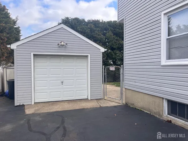 a front view of a house with a garage