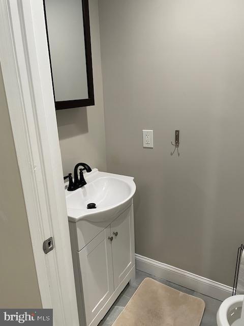906 I Street Southeast, Unit 2 Washington, DC 20003 - Photo 12 of 14 a bathroom with a sink and mirror