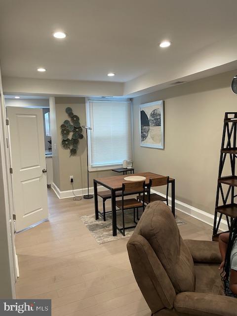 906 I Street Southeast, Unit 2 Washington, DC 20003 - Photo 3 of 14 a living room with furniture and a flat screen tv