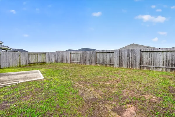 a view of a backyard with a garden