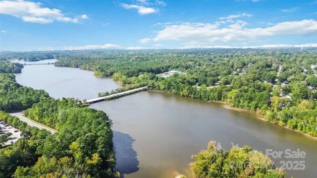 a view of a lake with a yard