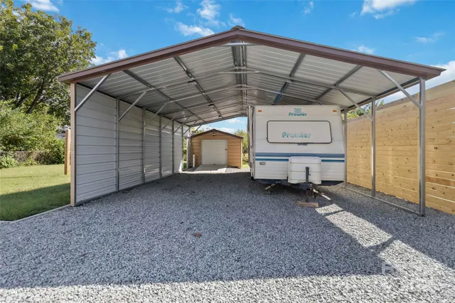a view of backyard with green space