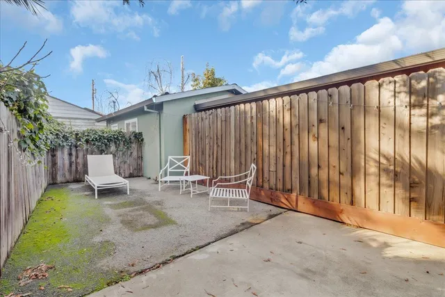 a view of two chairs in patio