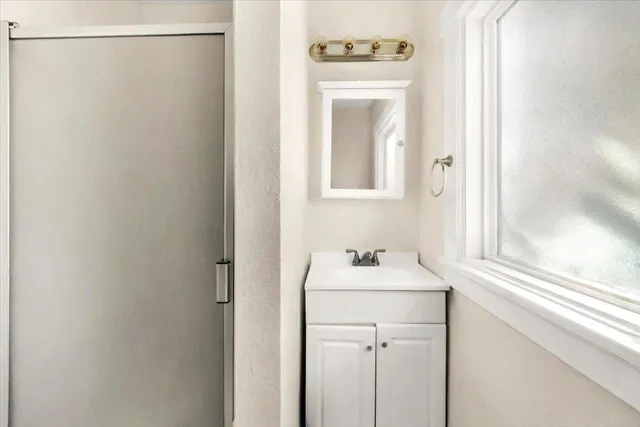 a utility room with a window dryer and washer