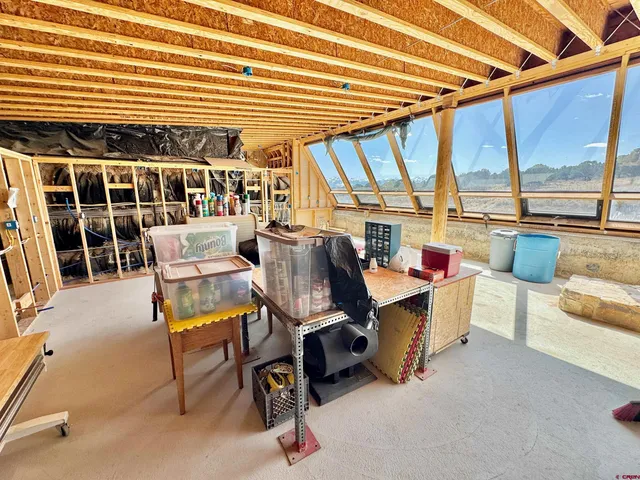 a view of a porch with wooden floor