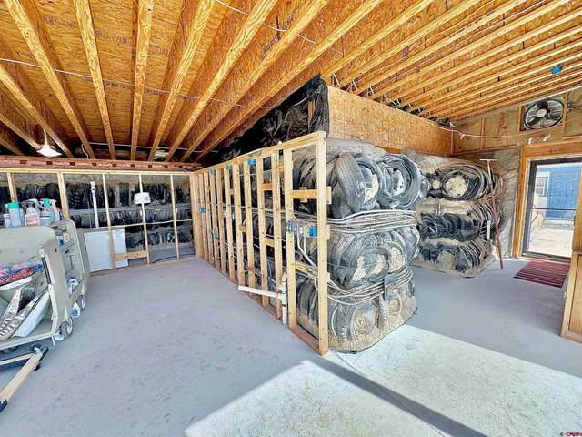 a view of entryway and livingroom with furniture