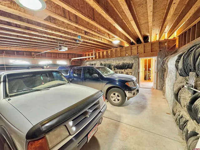 an aerial view of a house with outdoor space