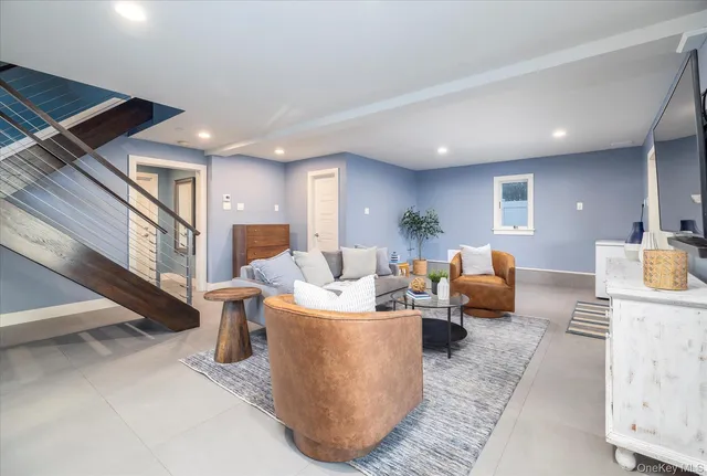 a living room with furniture and a table