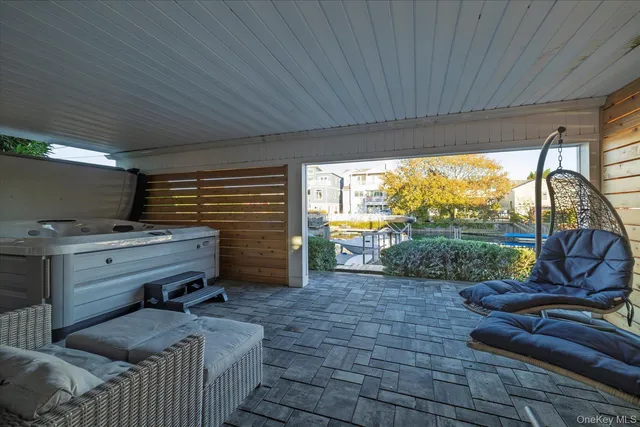 a view of a patio with furniture