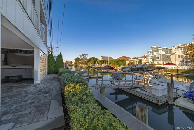 a view of a chairs and table in patio