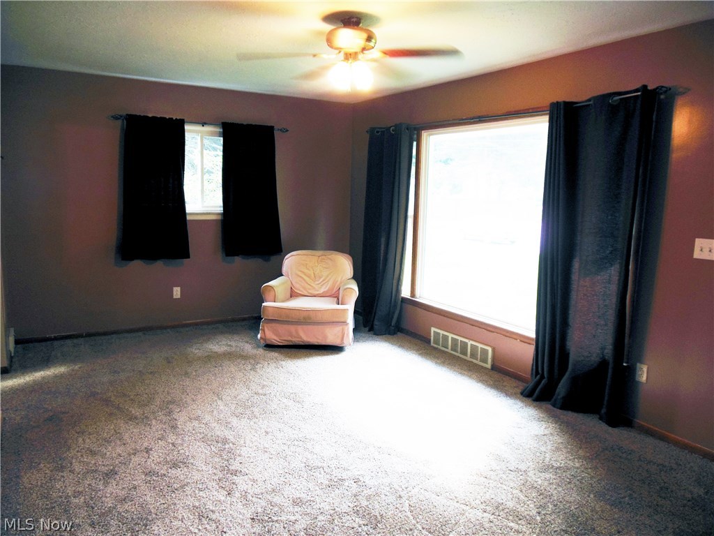 6849 Lake Road Madison, OH 44057 - Photo 5 of 18 Living Room with newer carpet
