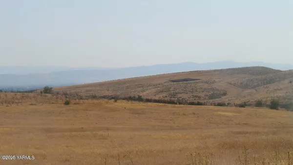 a view of beach and mountains