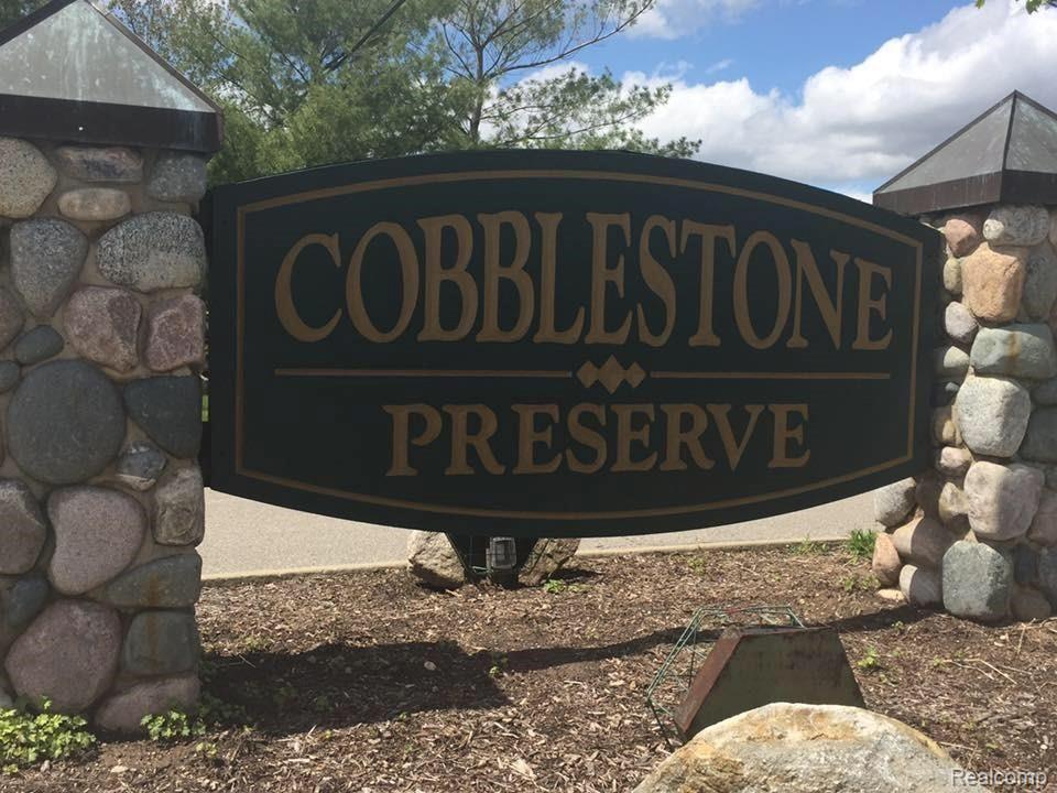 1455 Andover Boulevard Howell, MI 48843 - Photo 63 of 63 Welcome home to Cobblestone Preserve