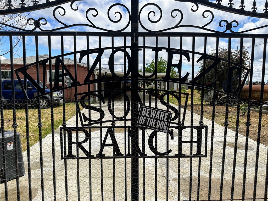 a view of a black and white street sign