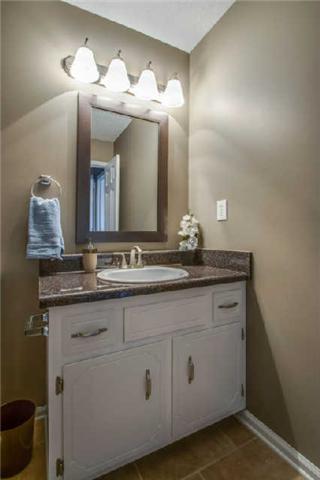 205 Ruf Drive Oak Grove, KY 42262 - Photo 15 of 20 a bathroom with a double vanity sink and a mirror