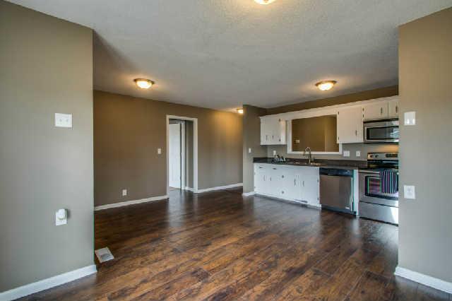 205 Ruf Drive Oak Grove, KY 42262 - Photo 7 of 20 a view of kitchen with kitchen island granite countertop stainless steel appliances refrigerator cabinets microwave and stove