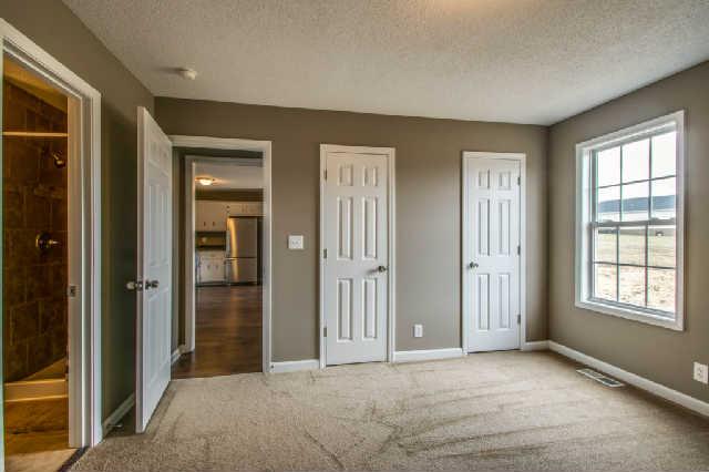 205 Ruf Drive Oak Grove, KY 42262 - Photo 10 of 20 an empty room with windows and closet