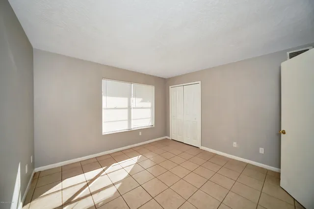 a view of an empty room with window