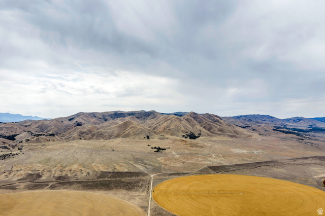12800 South Crooked Cyn Road South Elberta, UT 84626 - Photo 40 of 48 Expansive land parcel featuring mountainous terrain and cultivated circular fields