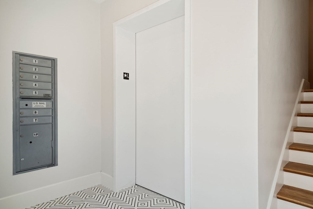 9 Glover Court, Unit 6 Boston, MA 02127 - Photo 28 of 34 a view of a hallway