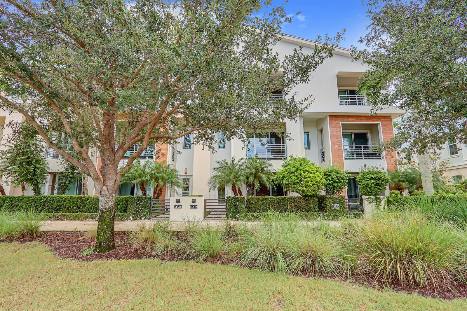 13332 Alton Road Palm Beach Gardens, FL 33418 - Photo 2 of 53 a view of house with outdoor space