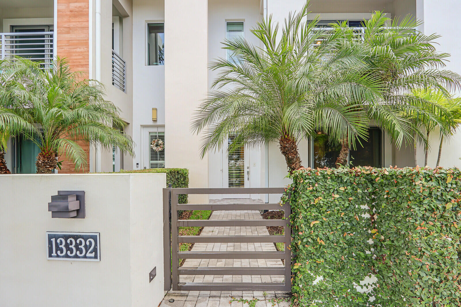 13332 Alton Road Palm Beach Gardens, FL 33418 - Photo 3 of 53 a view of a front door of house