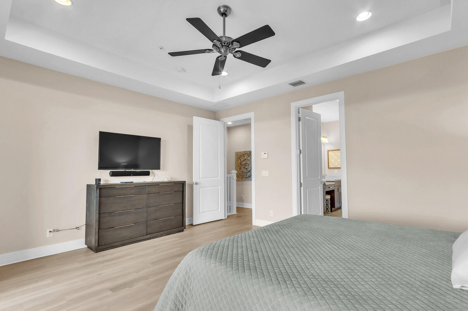 13332 Alton Road Palm Beach Gardens, FL 33418 - Photo 31 of 53 a bedroom with a bed and a flat screen tv