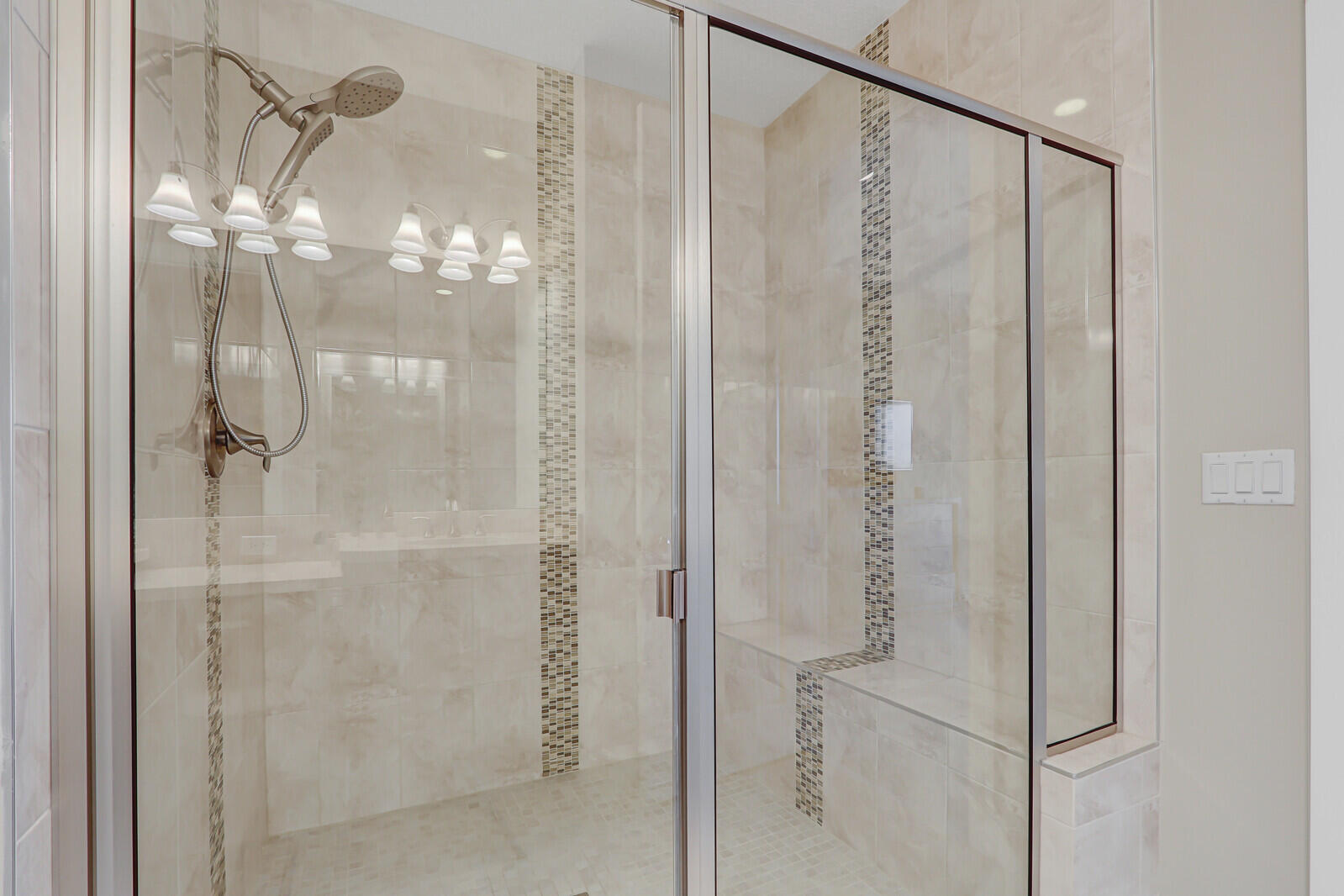 13332 Alton Road Palm Beach Gardens, FL 33418 - Photo 33 of 53 a bathroom with a glass shower door