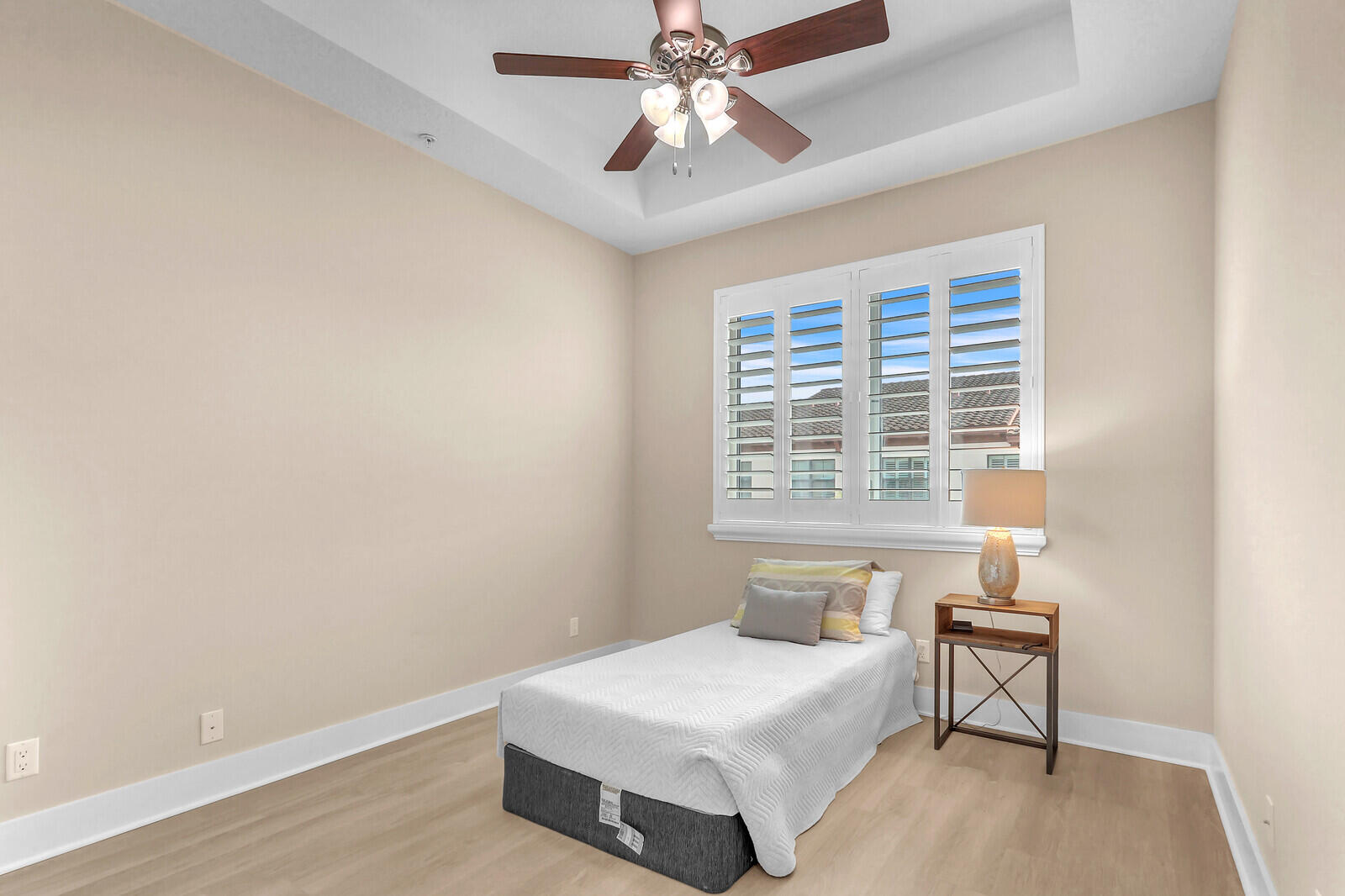 13332 Alton Road Palm Beach Gardens, FL 33418 - Photo 35 of 53 a bedroom with a bed and a window