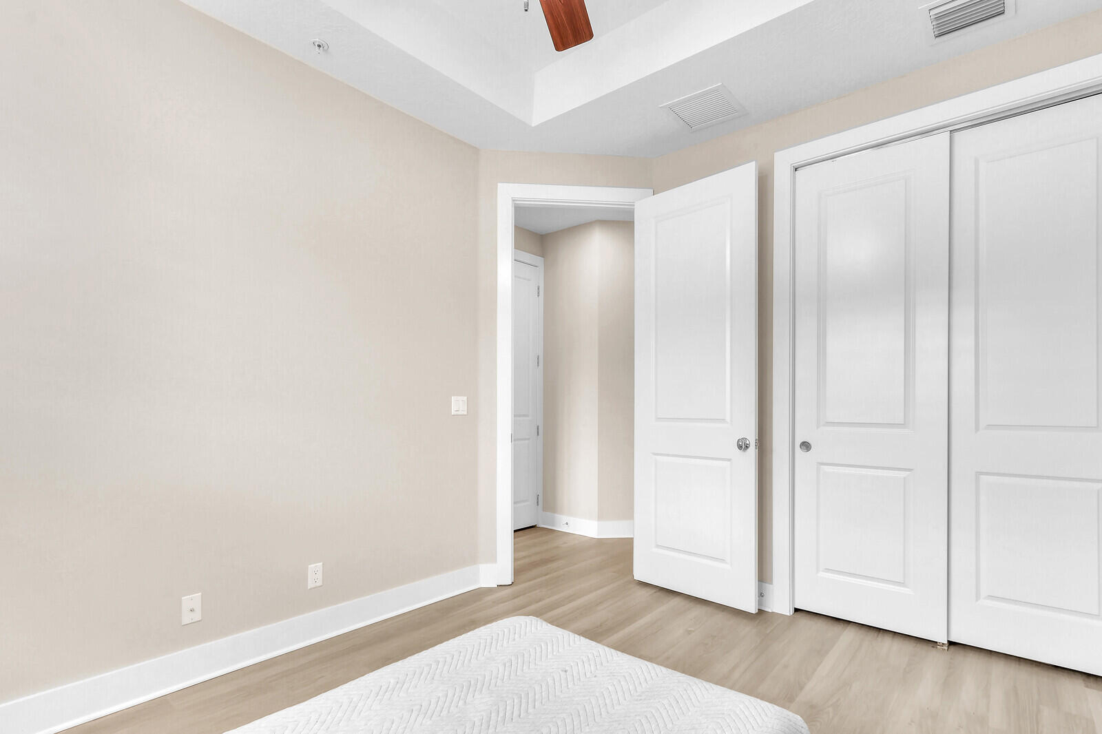 13332 Alton Road Palm Beach Gardens, FL 33418 - Photo 36 of 53 an empty room with wooden floor